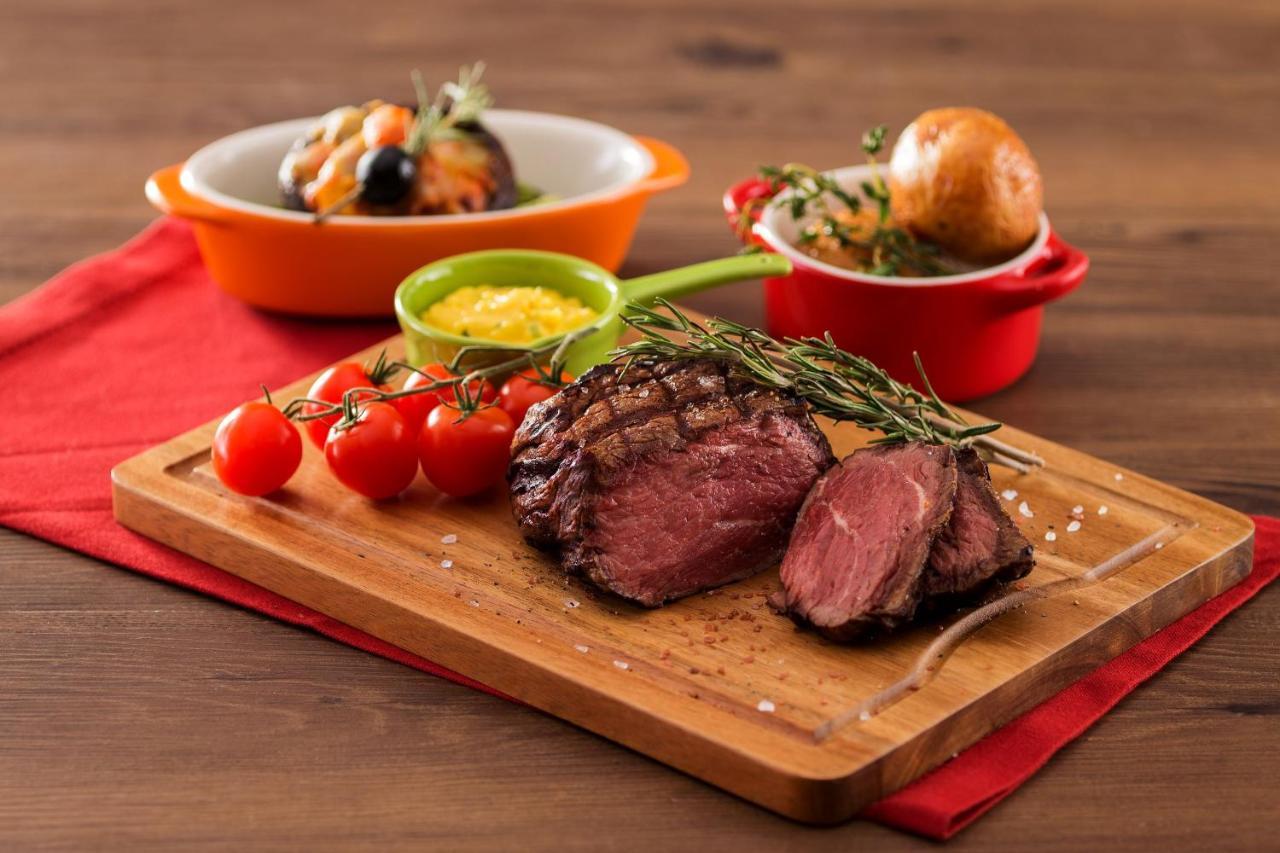 Hong Kong Gold Coast Hotel Екстериор снимка A steak prepared with the dry-aging technique